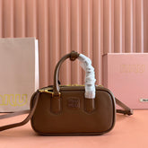 ARCADIE BAG 19 IN TAWNY BROWN SHINY CALFSKIN